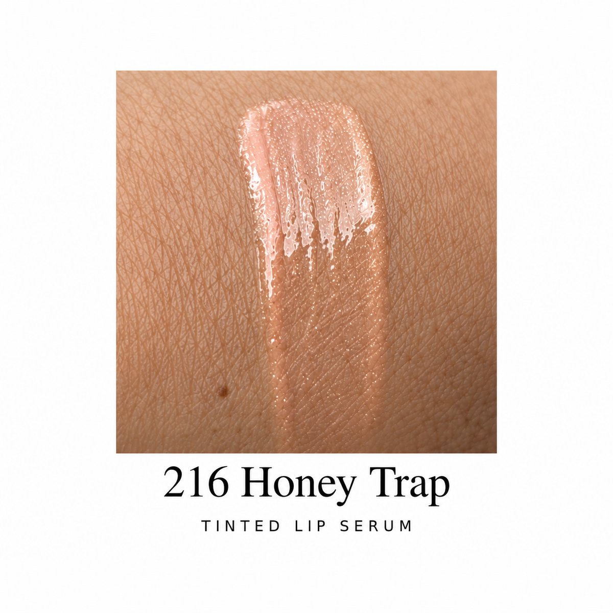 Katie Lynn BEAUTY Honey Trap Tinted Lip Serum, shade 216 arm swatch